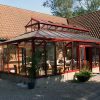 Orangeri Special, kundannpassat designat växthus i hörn Rött växthus